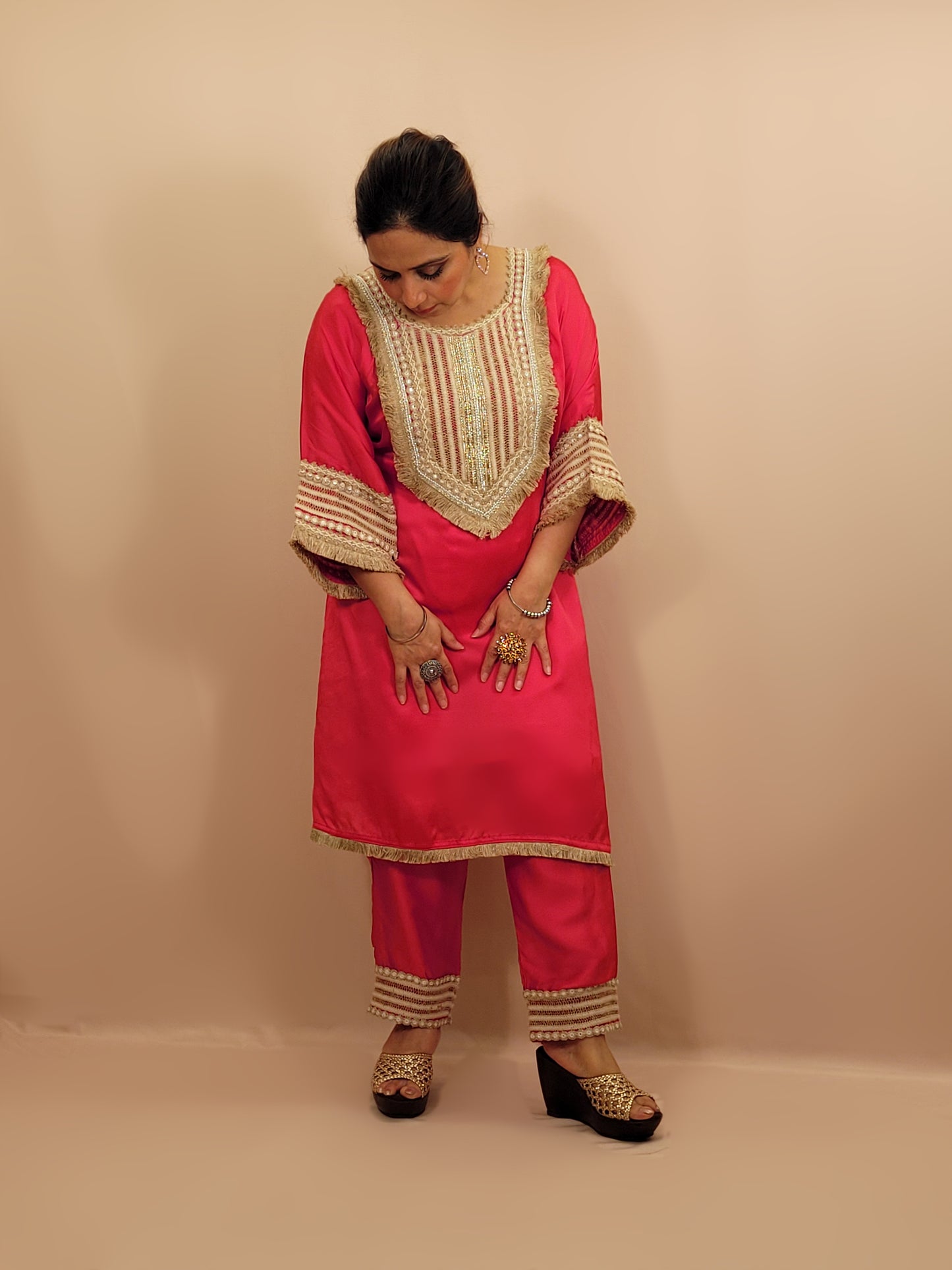 Rani Pink Satin Indowestern Dress with beautiful laced neck, sleeves and pants.