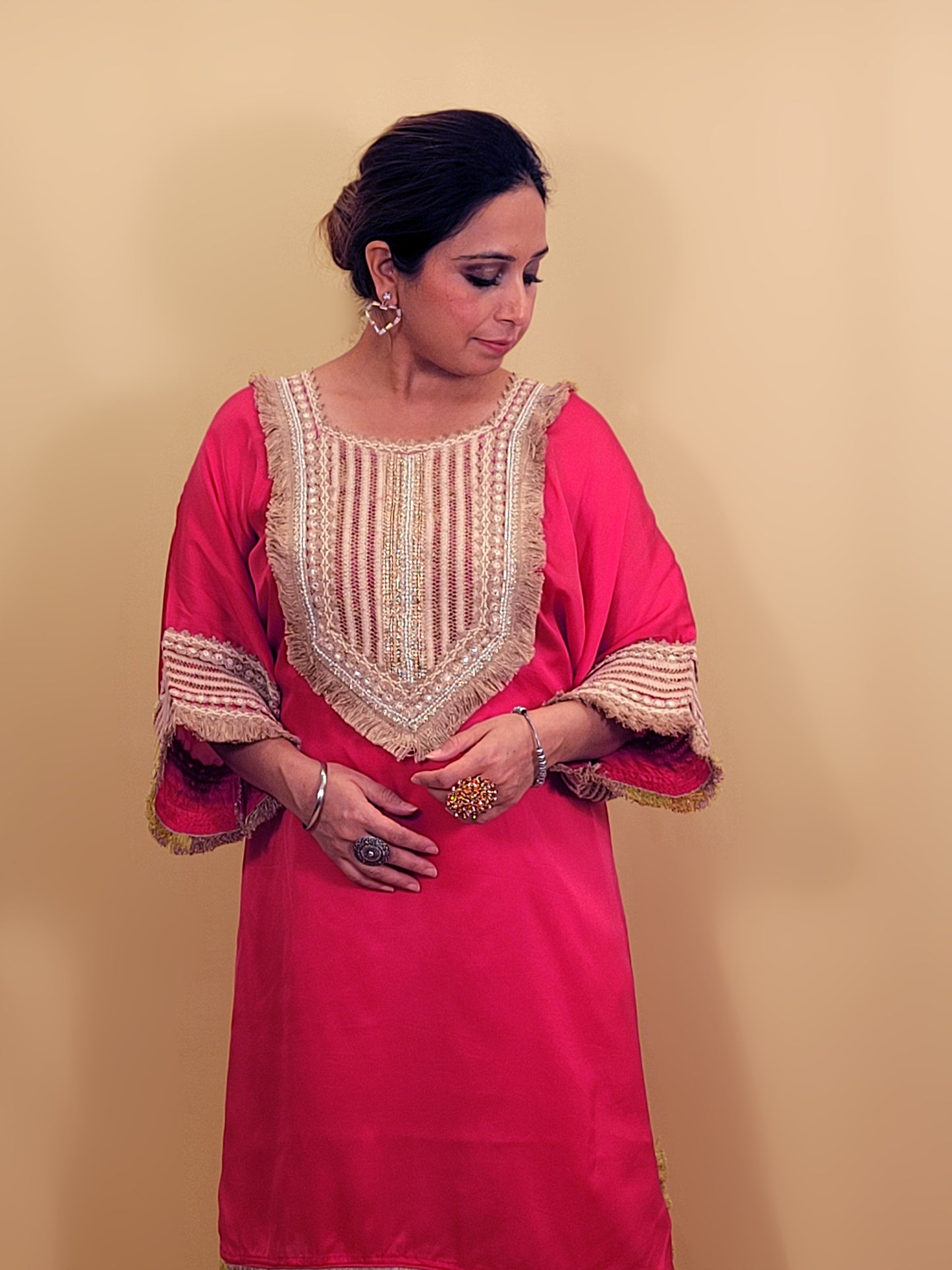 Rani Pink Satin Indowestern Dress with beautiful laced neck, sleeves and pants.