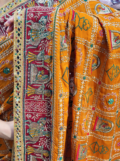 This beautiful mustard yellow silk saree with a beautiful maroon pallu that makes it stand out from the crowd. The saree features intricate cutdana, zari, and thread work that gives it a touch of elegance and class. This saree is perfect for any party, wedding, or even as a bridal wear.