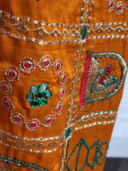 This beautiful mustard yellow silk saree with a beautiful maroon pallu that makes it stand out from the crowd. The saree features intricate cutdana, zari, and thread work that gives it a touch of elegance and class. This saree is perfect for any party, wedding, or even as a bridal wear.