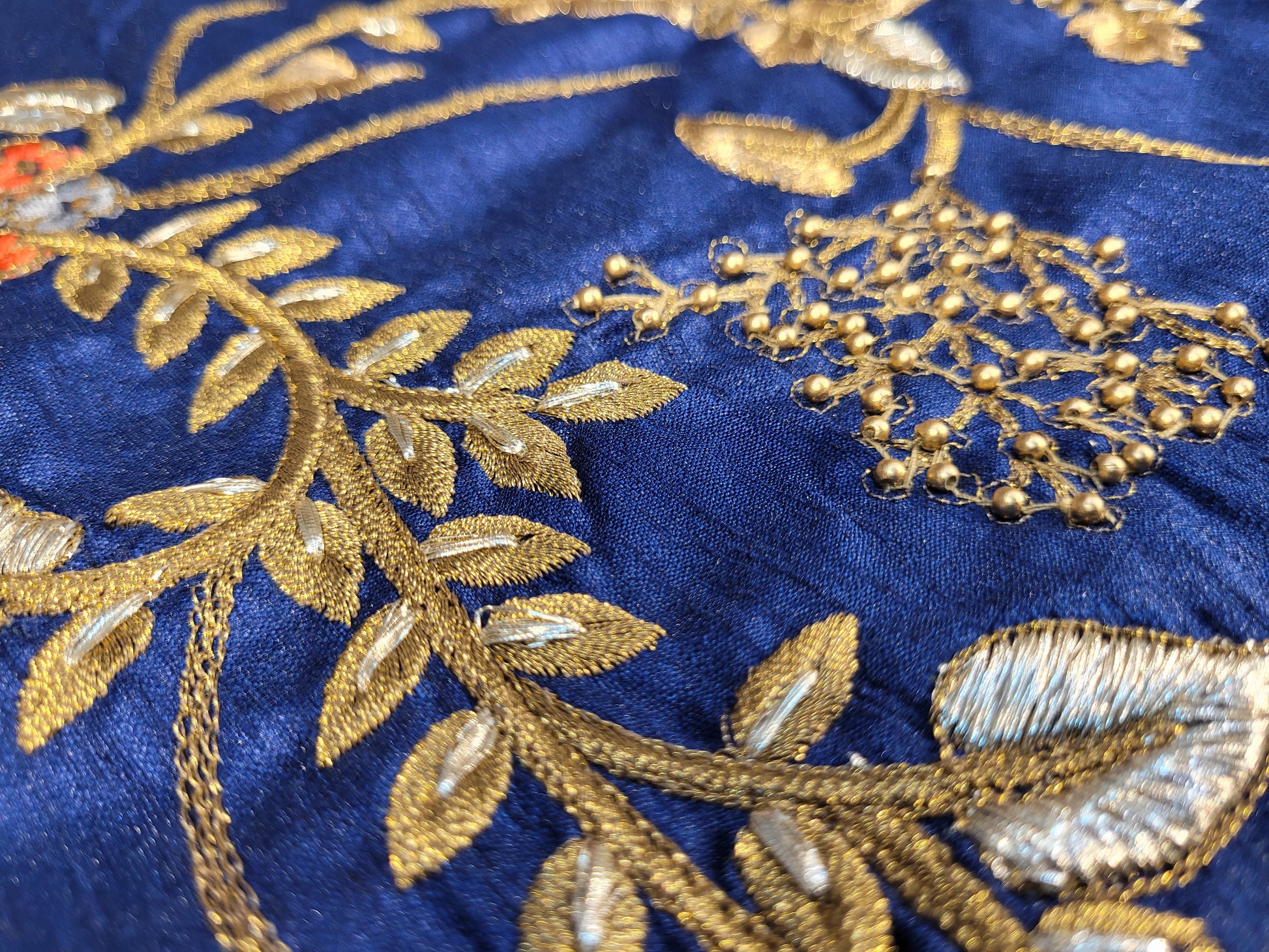 Grey Crepe Saree with Blue Border. Handwork using Zari and Moti. Heavy unstitched Blouse Piece.