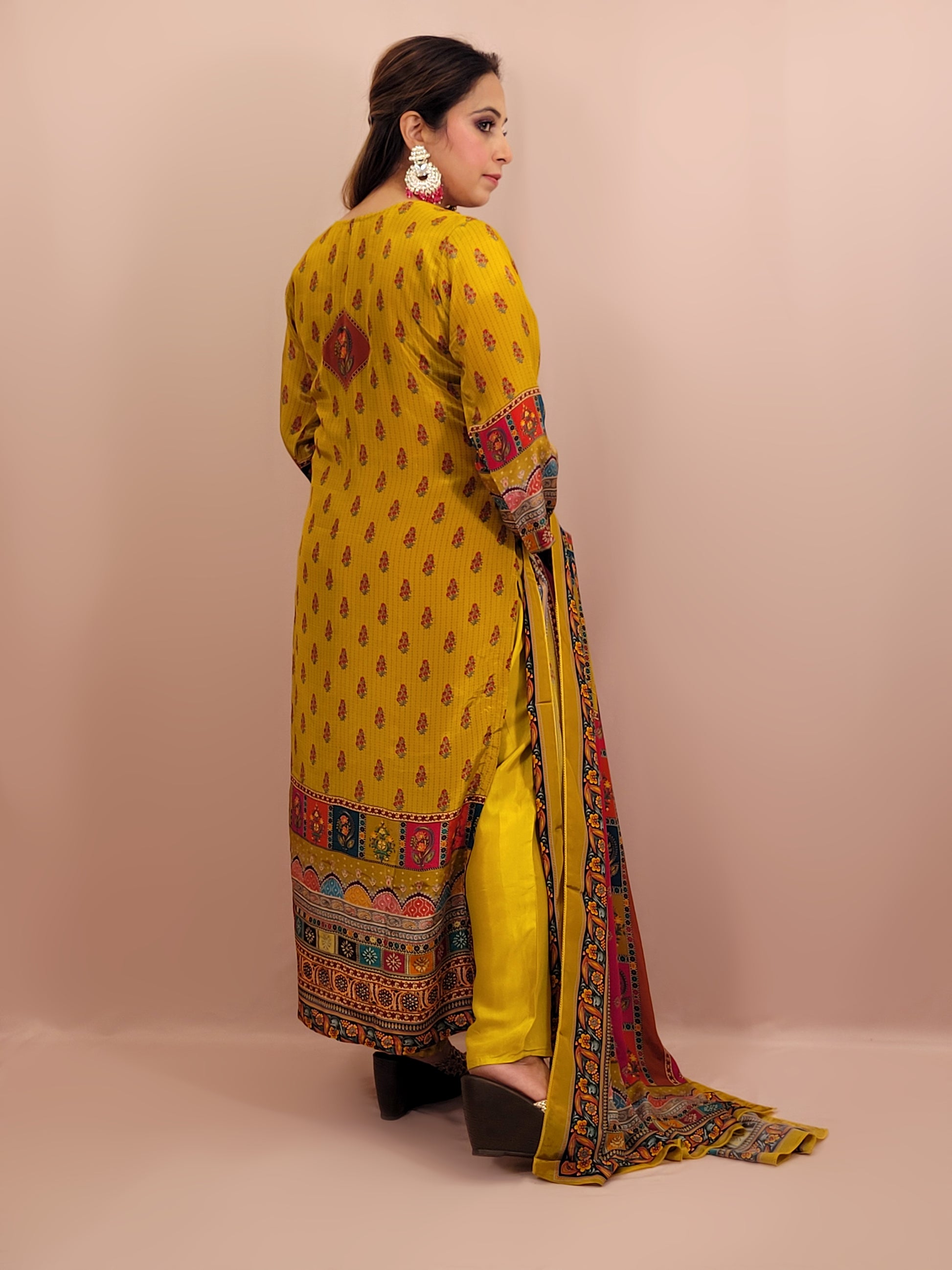 Mustard Yellow Pakistani Lahori Straight Suit with Pants . Highlighted with mirror and&nbsp; badla zari.