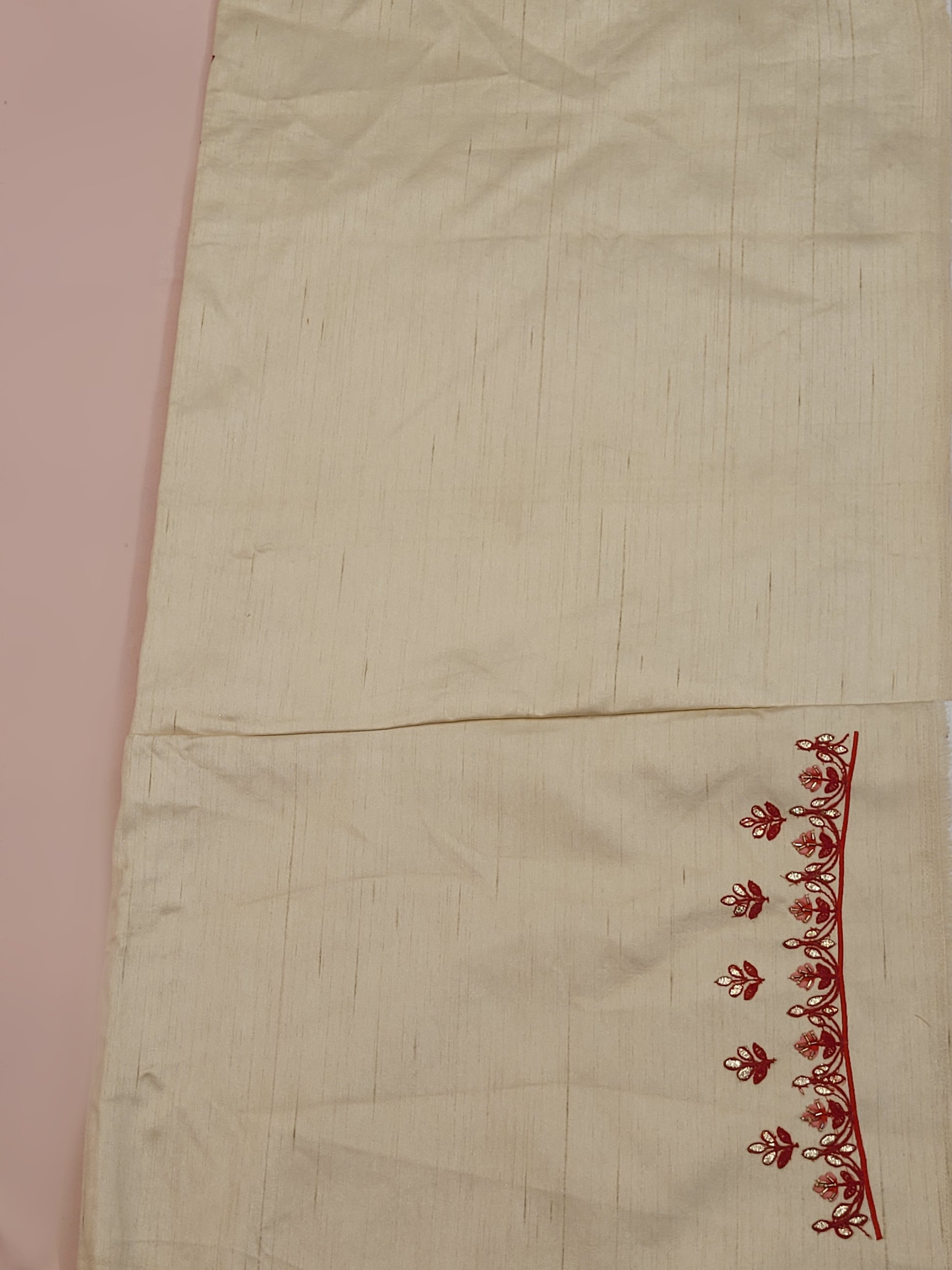 Immerse yourself in the elegance of Indian tradition with this exquisite Cream color silk unstitched lehenga, inspired by the renowned designer Anita Dongre. This lehenga is a true masterpiece, featuring intricate resham embroidery and delicate beads work that beautifully adorns the luxurious silk fabric, creating a captivating and sophisticated look.