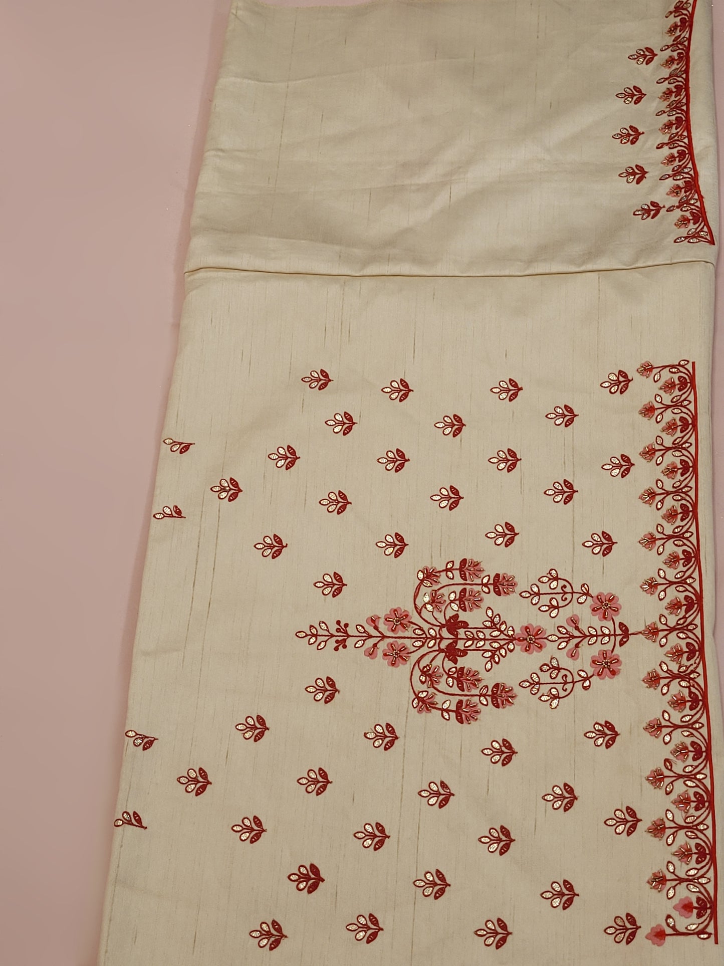 Immerse yourself in the elegance of Indian tradition with this exquisite Cream color silk unstitched lehenga, inspired by the renowned designer Anita Dongre. This lehenga is a true masterpiece, featuring intricate resham embroidery and delicate beads work that beautifully adorns the luxurious silk fabric, creating a captivating and sophisticated look.