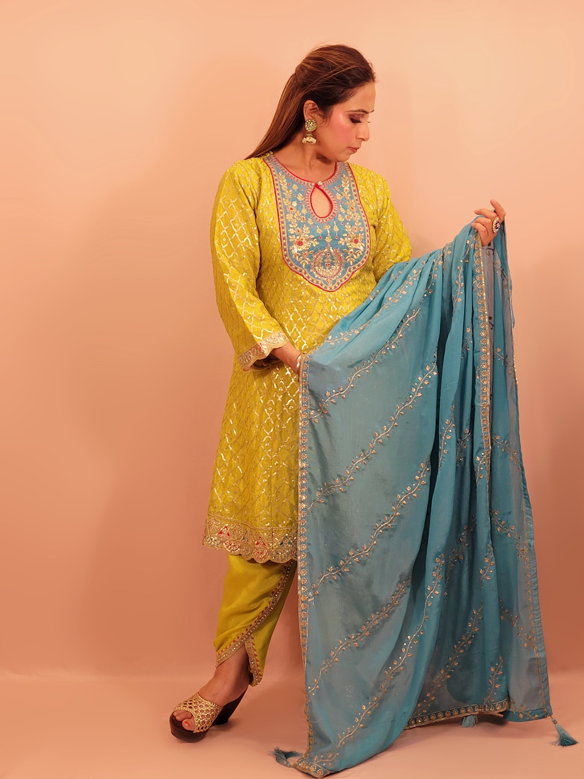 Green Chinnon Anarkali with matching Tulip Pants. Contrast neck yolk with resham, zari and sequins. Contrast Dupatta. Latest trend in Indian ethnic fusion wear.