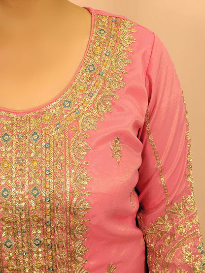 Pink Shimmer Sharara Suit. Heavy Zari Sequins Neckline. Heavy sleeves, bottom and dupatta.