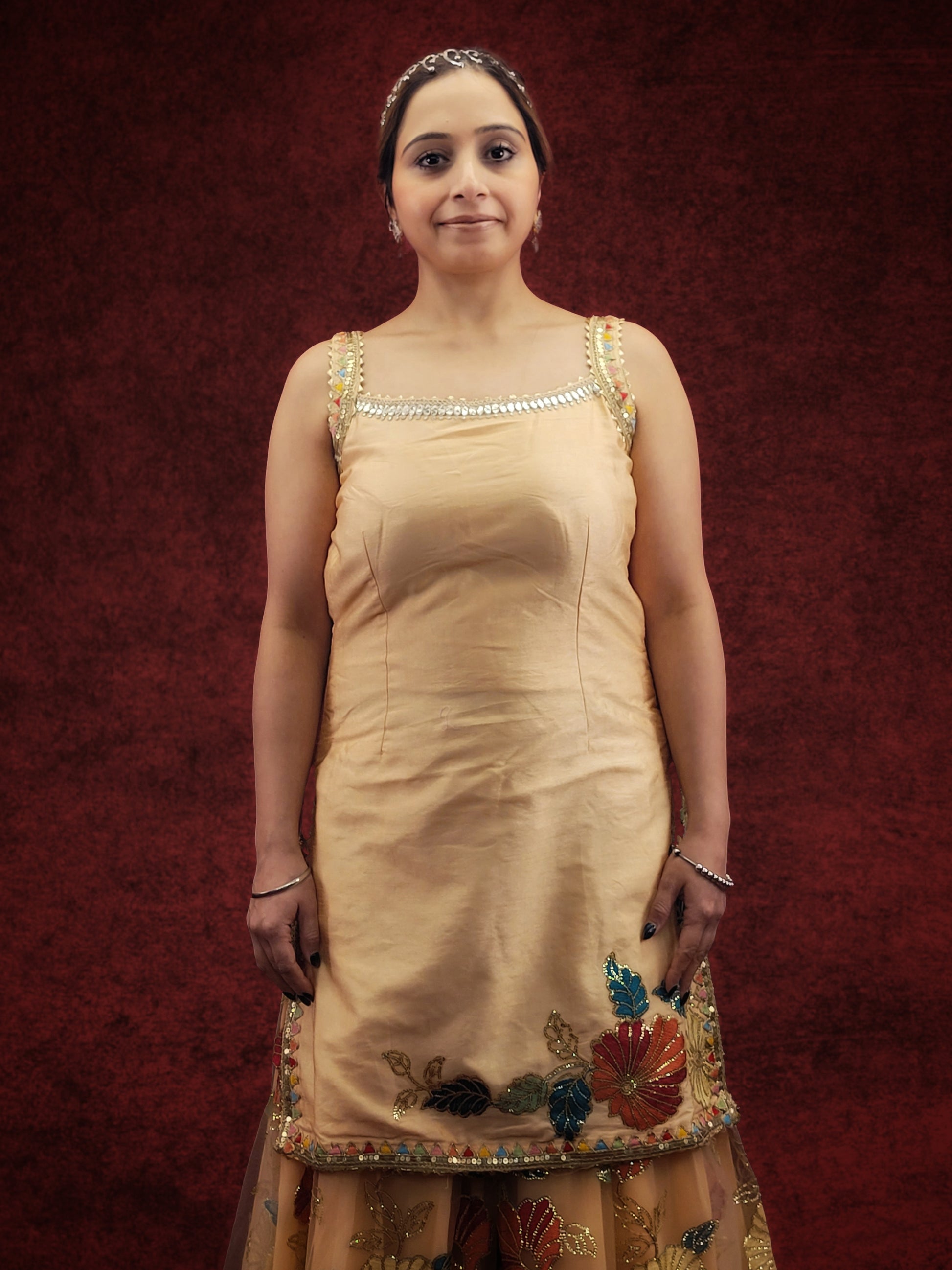 Silk Top, Net Gharara and Dupatta. Threadwork Highlighted with Sequins. Perfect for party wear and festive wear.