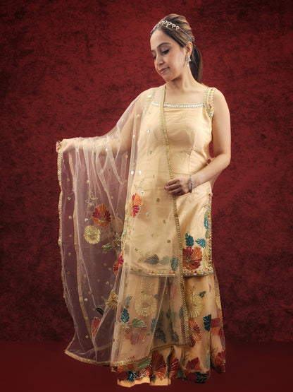 Silk Top, Net Gharara and Dupatta. Threadwork Highlighted with Sequins. Perfect for party wear and festive wear.