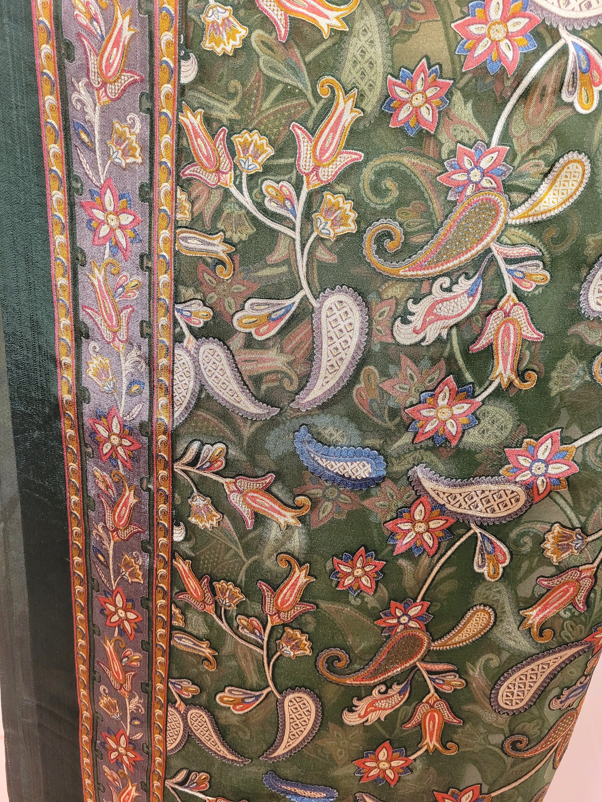 Muslin Green Suit with Designer multicolor Brasso Dupatta. Hand Embroidered Neckline using Resham, Dabka, and Beads.