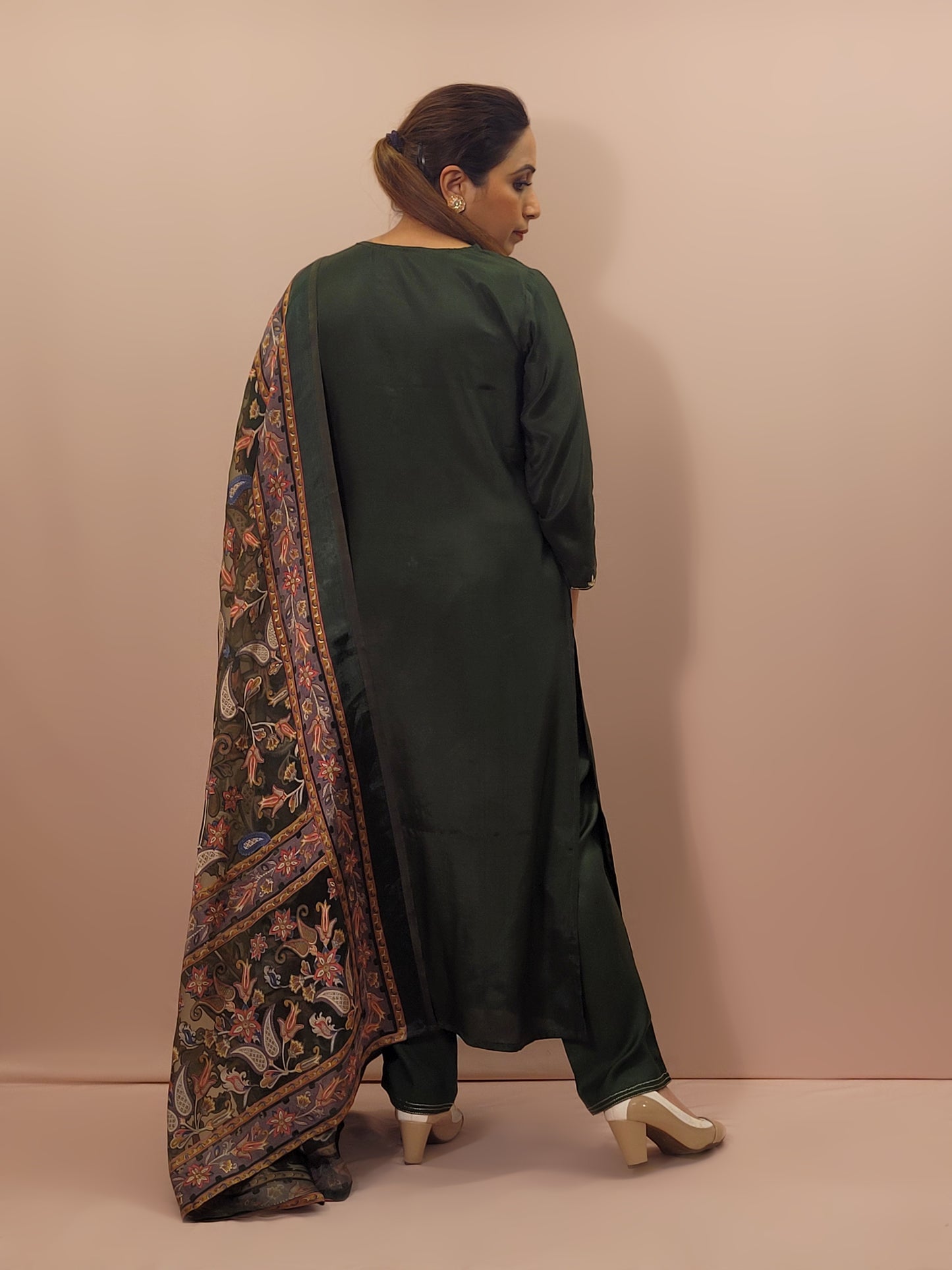 Muslin Green Suit with Designer multicolor Brasso Dupatta. Hand Embroidered Neckline using Resham, Dabka, and Beads.