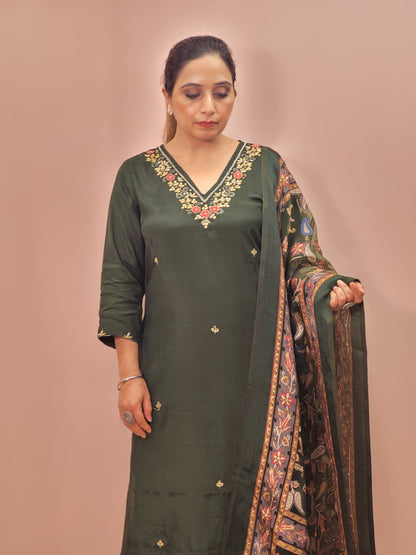 Muslin Green Suit with Designer multicolor Brasso Dupatta. Hand Embroidered Neckline using Resham, Dabka, and Beads.