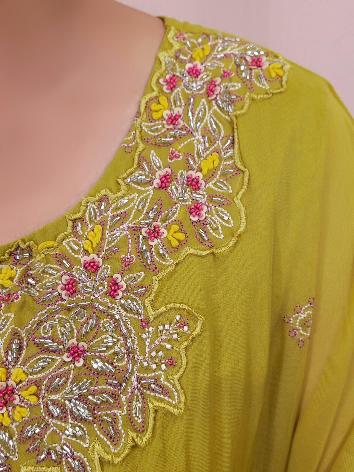 Green Georgette Kaftan with Pants. Beads and thread work on neckline. Printed Pants.